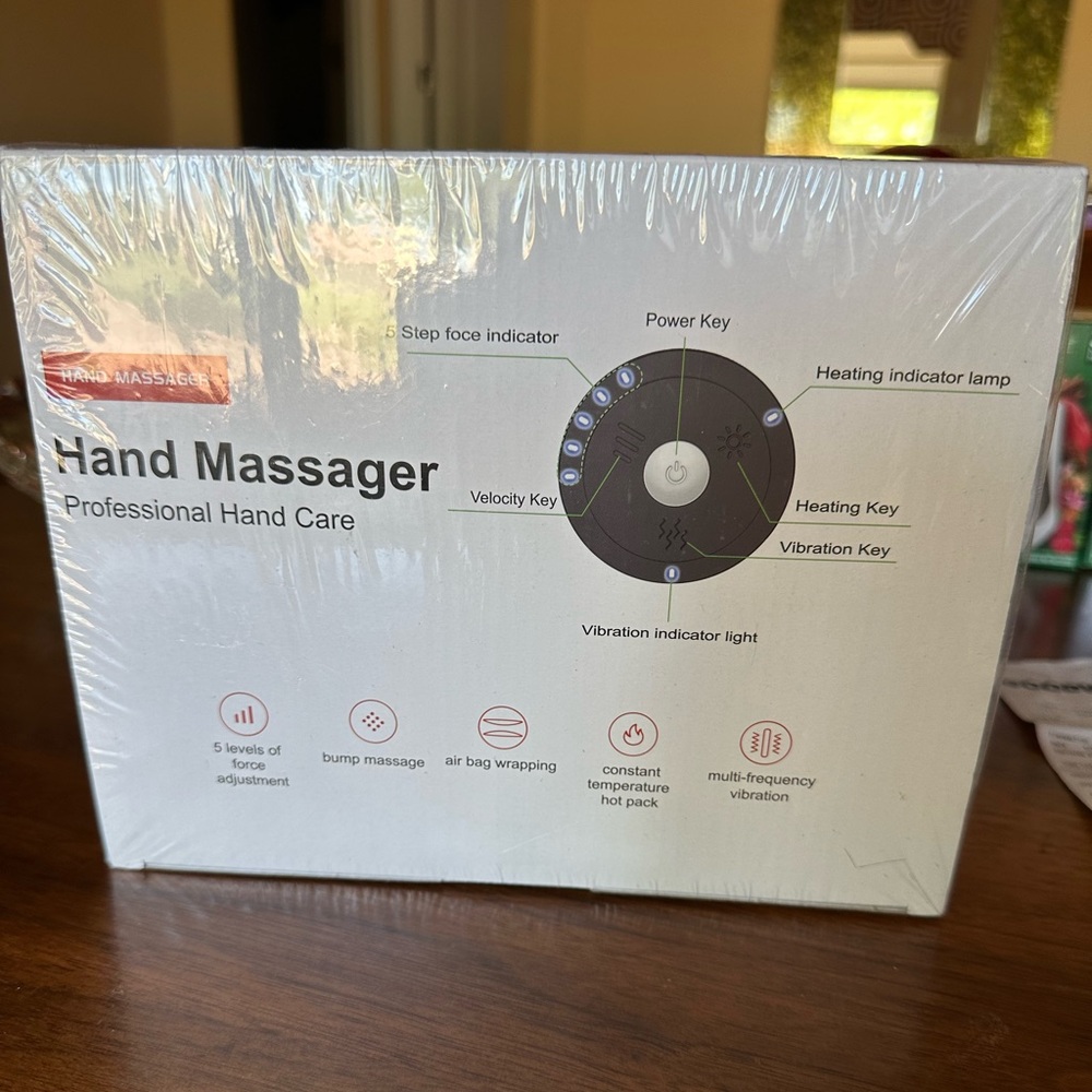 NIB Smart Hand Massager See photos for details. Fast shipping. Sealed box.